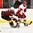 GRAND FORKS, NORTH DAKOTA - APRIL 21: \lden14\ passes the puck while Latvia's Renars Krastenbergs #17 defends during relegation round action at the 2016 IIHF Ice Hockey U18 World Championship. (Photo by Matt Zambonin/HHOF-IIHF Images)

